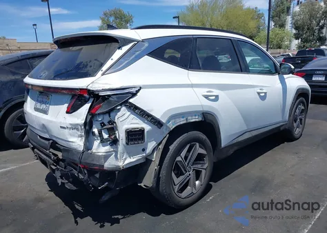 2022 Hyundai Tucson Hybrid Limited из США, поврежденный, VIN KM8JECA18NU034049